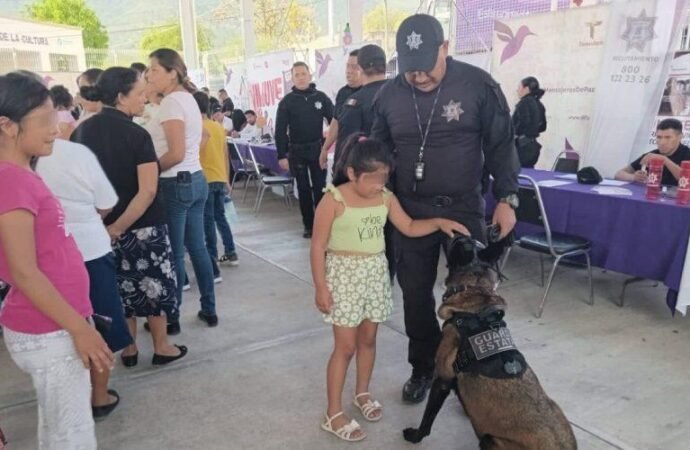 Agrupamiento canino de la Guardia Estatal convive con la ciudadanía en Brigada “Transformando Familias”